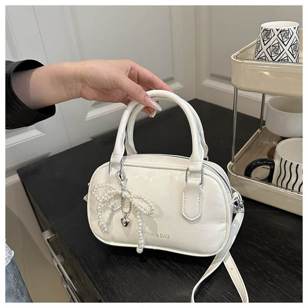 Bolsa tiracolo fashion simples quadrada 2025 verão nova coleção pérola laço borboleta ombro único transversal tendência