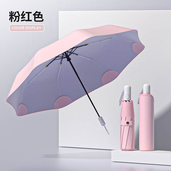 Um guarda-chuva automático masculino reforçado com chuva e chuva dois com um guarda-chuva feminino triplo e um guarda-chuva de sol dobrável