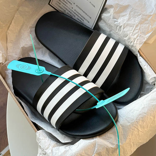 Sapatos masculinos e femininos do mesmo modelo para o verão com um novo modelo de deslizamento de fundo plano anti-odor eva velocidade seca uma palavra deslocação de esportes de lazer