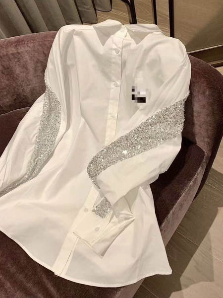 Blusa com detalhes em purpurina